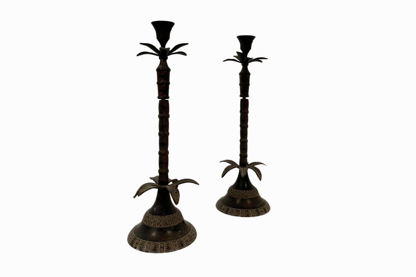 A pair of metal Faux Bamboo candlesticks