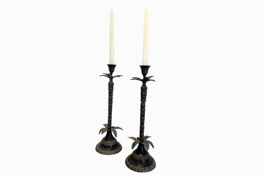 A pair of Faux Bamboo metal candlesticks