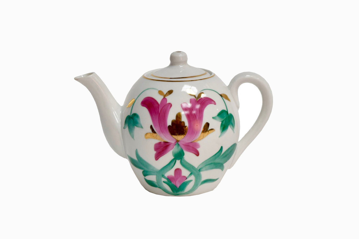 Tetera uzbeki con decoración de flores rosas