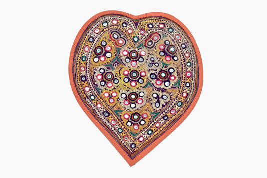 Embroidered heart with orange binding