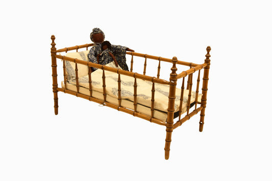 Doll's bed in faux bamboo