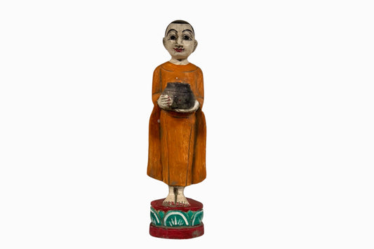 Painted wooden sculpture of a Buddhist monk