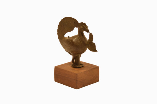 Cast brass Hamsa bird on plinth