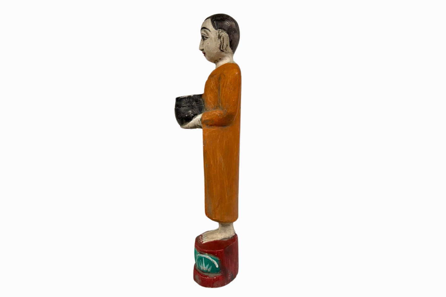 Painted wooden sculpture of a Buddhist monk