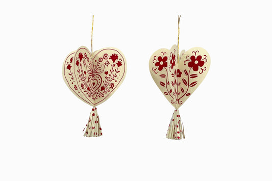 A Pair of Cream & Red Heart shaped Paper Decorations