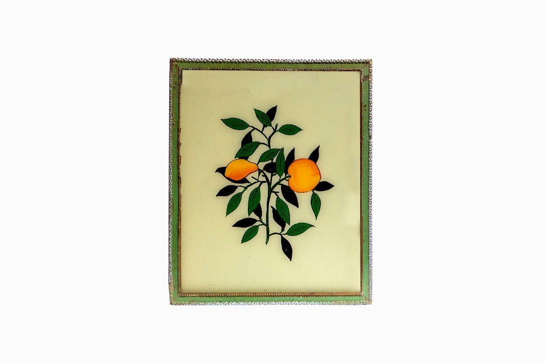 An Indian glass painting of lemons, green frame. (Medium)