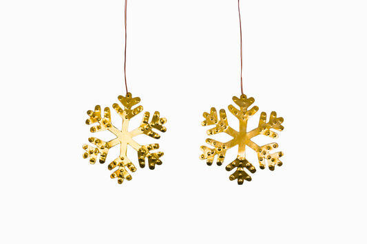 A Pair of Gold Snowflake Decorations