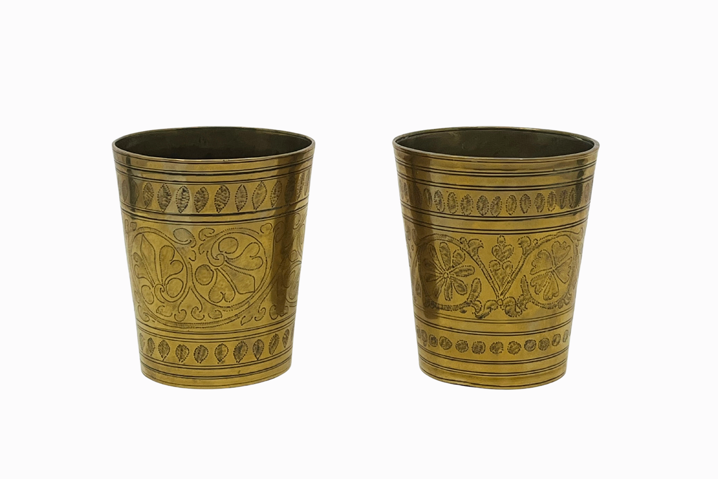 A pair of small brass vases