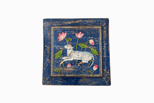 Holy cow on a blue panel