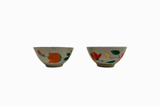 A pair of hand painted gold rimmed Uzbeki bowls