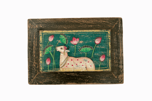 Holy cow on a green panel