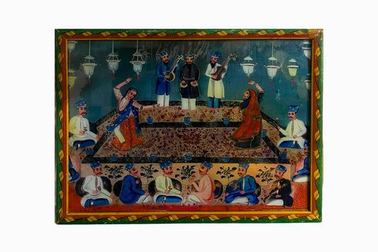 A  Framed Print of Mughal Musicians and Dancers