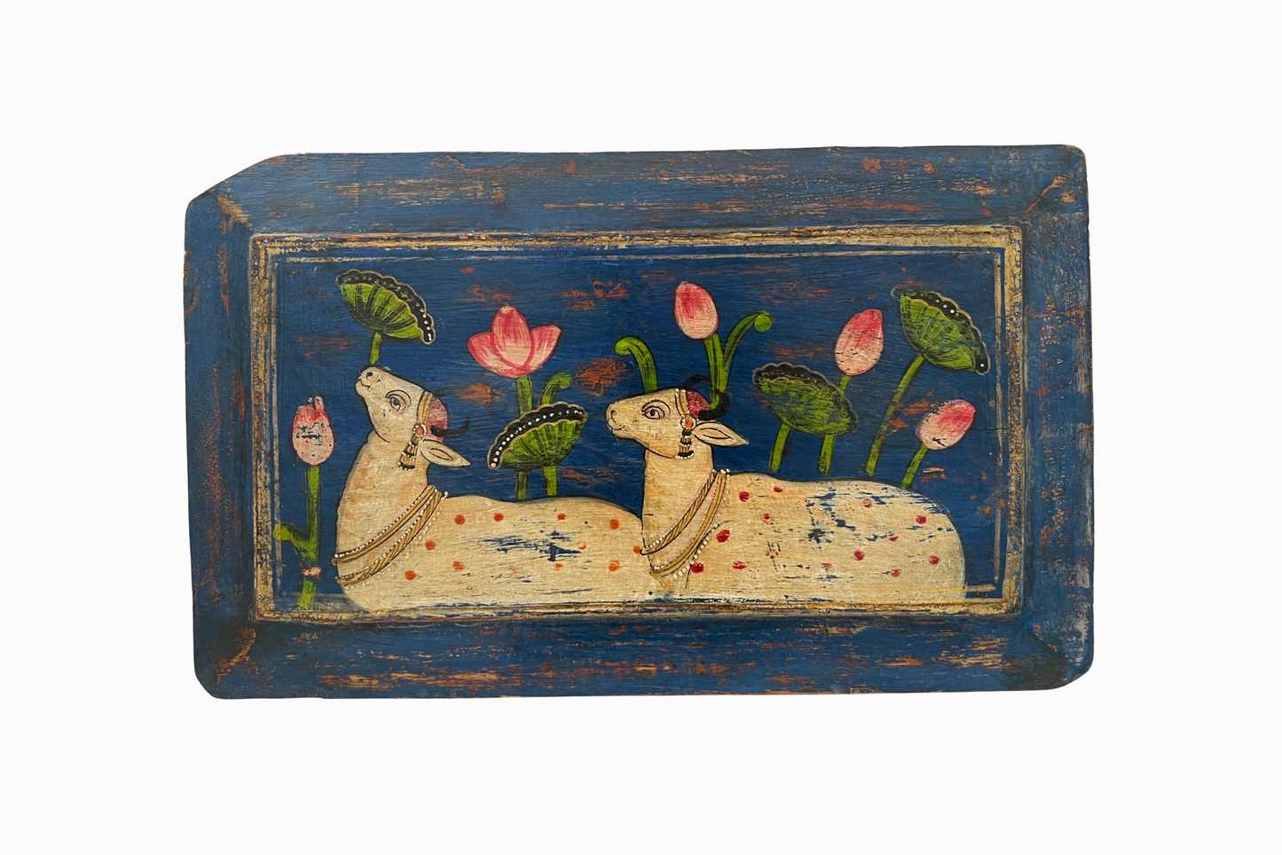Holy cows on a blue panel