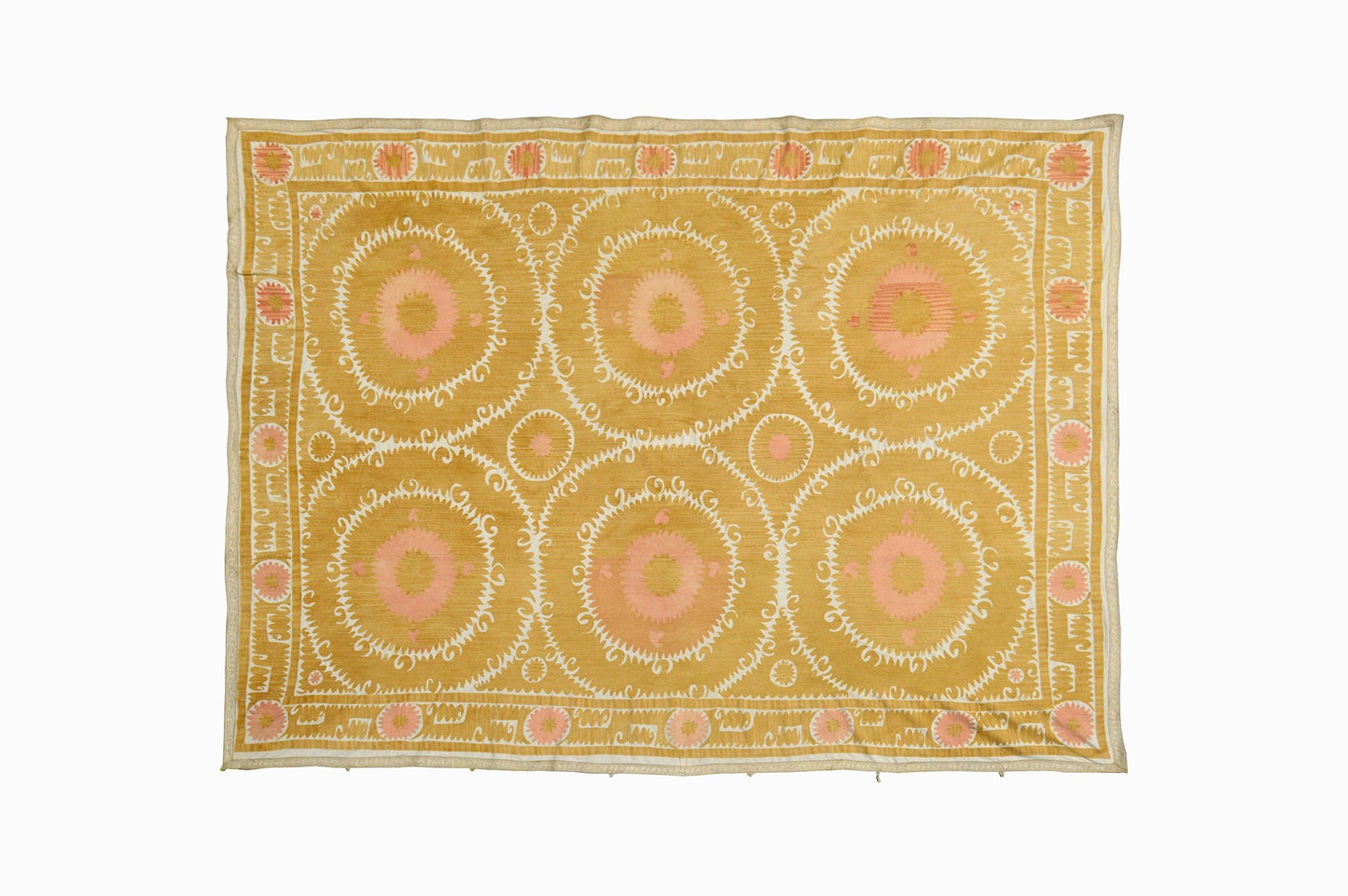 Pale Suzani wall hanging or bedspread.