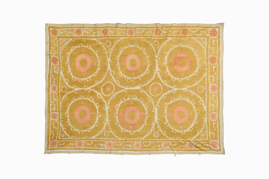 Pale Suzani wall hanging or bedspread.