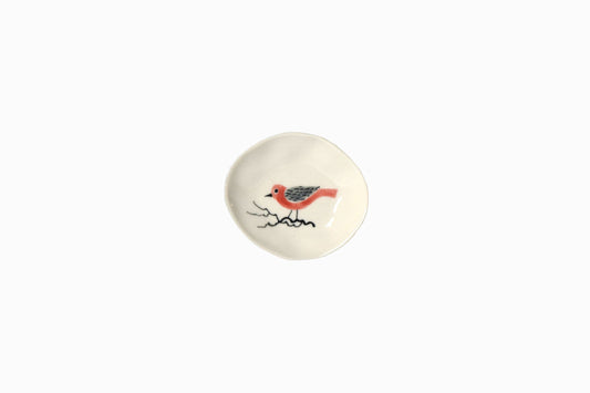 Tiny porcelain dish with red bird