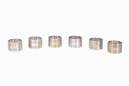 Set of six silver plate napkin rings