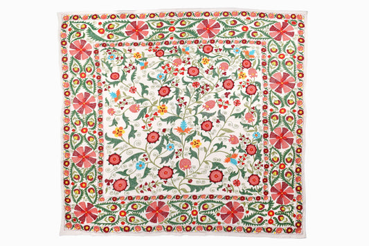 An embroidered Uzbeki Suzani BS25/WH85