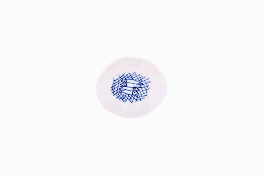 Tiny porcelain dish with blue fishes