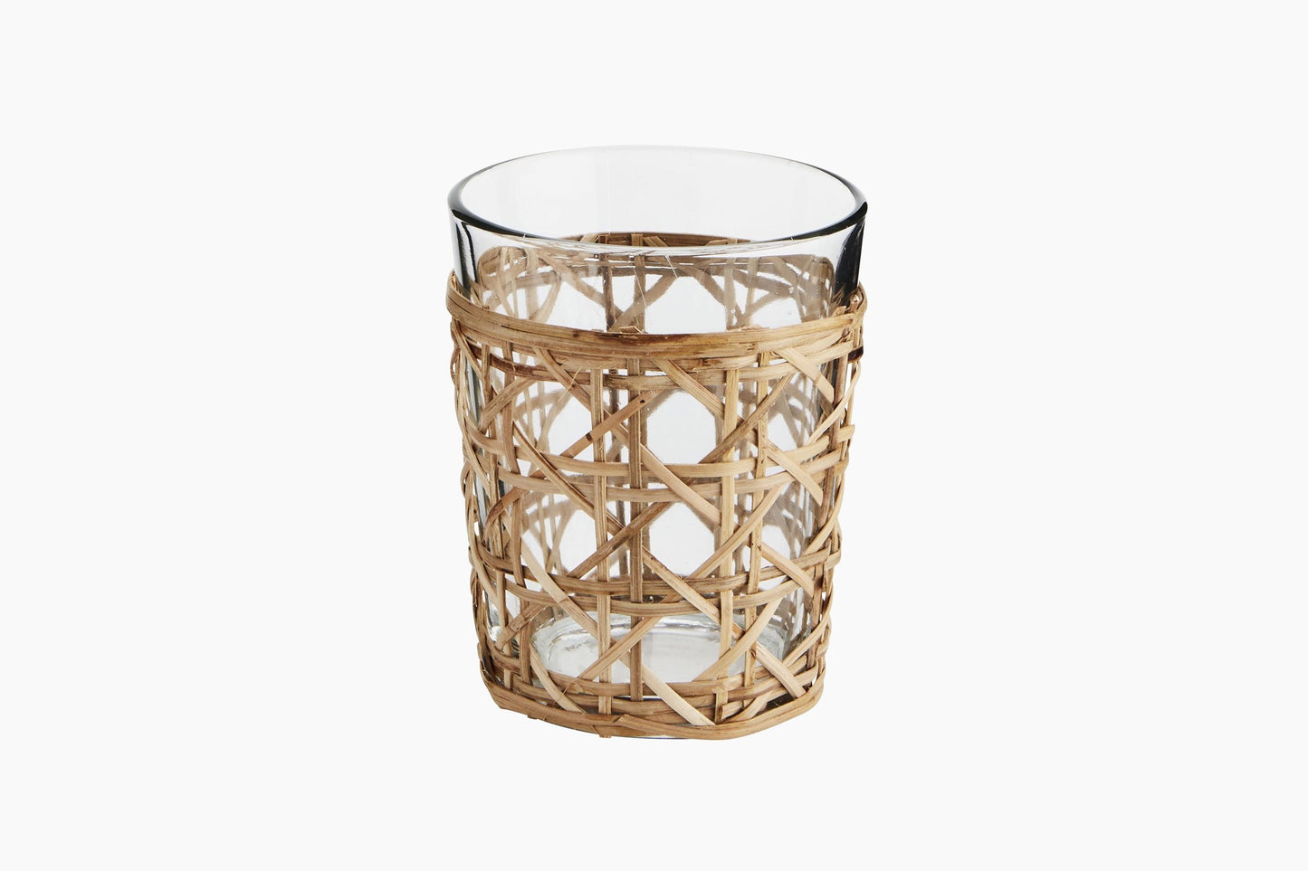 Drinking glass in bamboo holder
