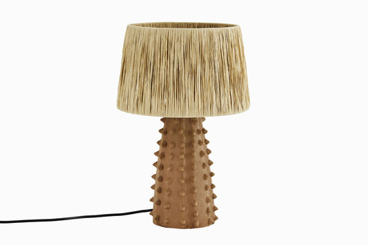 Terracotta lamp with straw shade