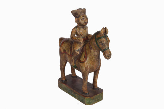 Hand  painted wooden man on horse