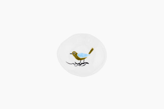 Tiny porcelain dish with green and blue bird